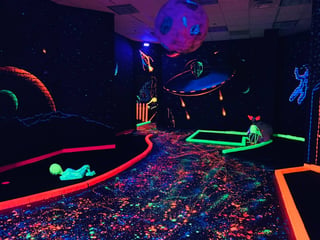 The Hero Day & Glow Golf