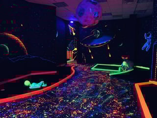 The Hero Day & Glow Golf