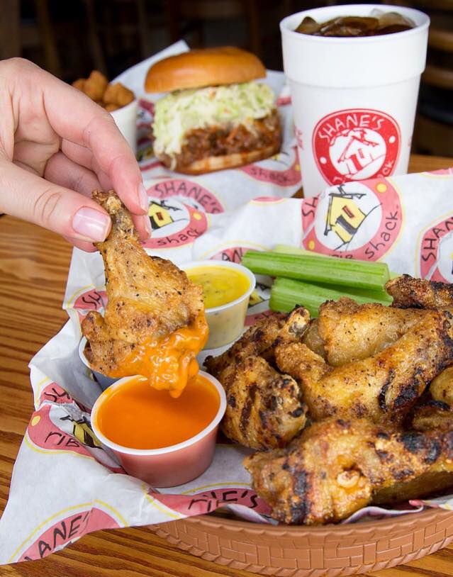 Smoked Wings Being Dipped.jpeg