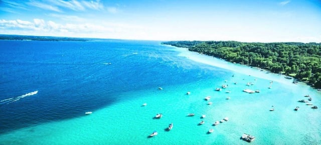 https___blogs-images.forbes.com_trevornace_files_2018_06_torch-lake-michigan-1200x545
