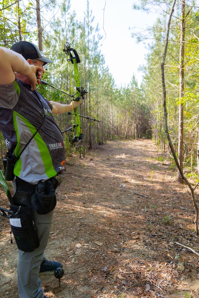 Archery at Spring Villa 2025 Man Aiming Bow (11).jpg