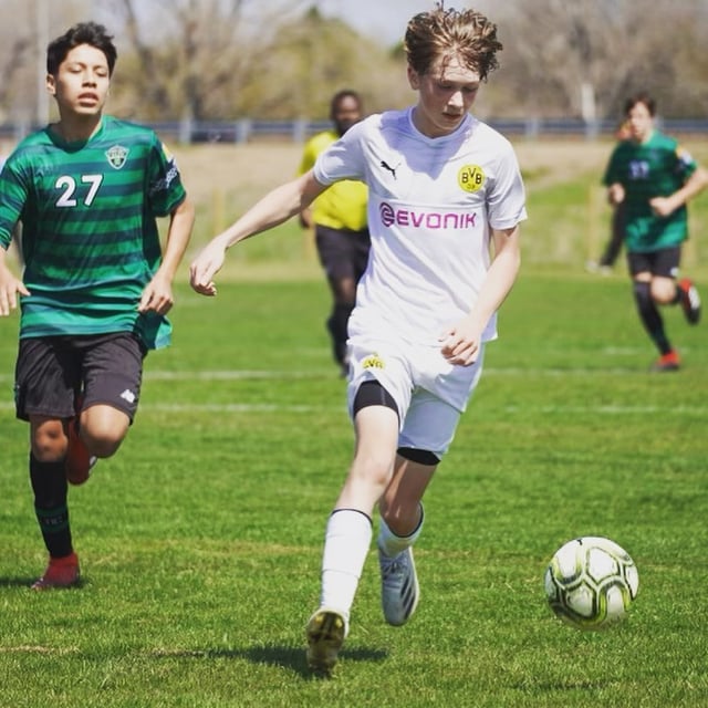 U90C Management Group action shot