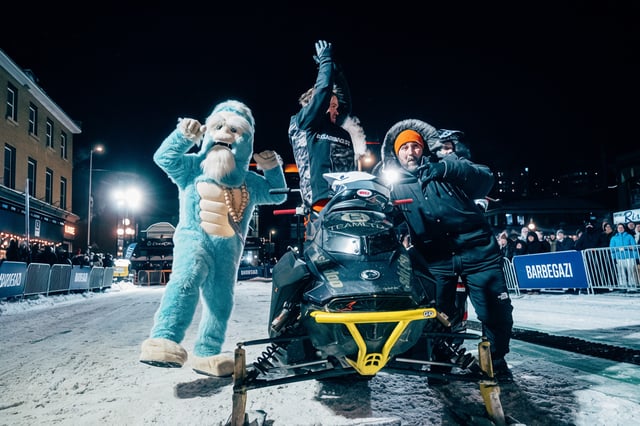 Barbegazi mascot with athletes.jpg