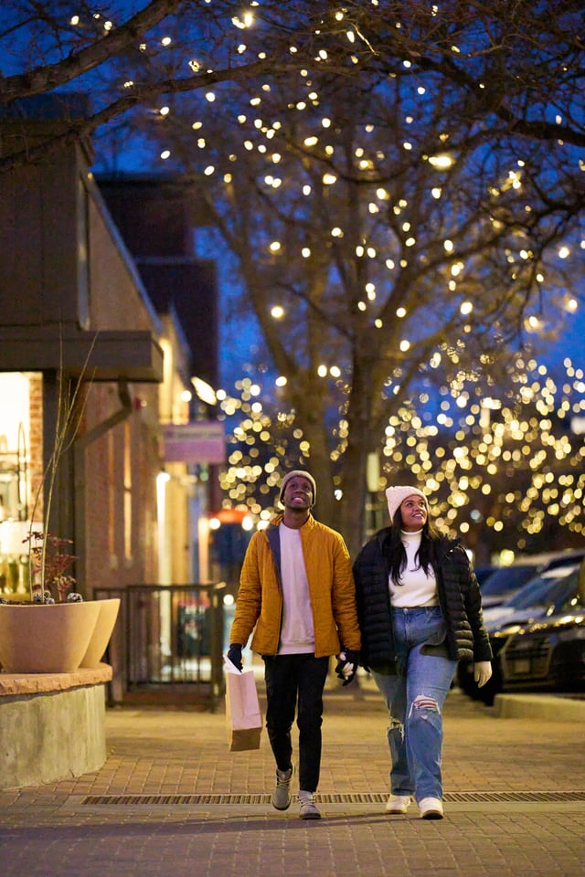 CTOWinterShoot_ShoppingCoupleOldTownSquareLights_Resized.jpg
