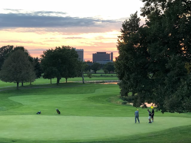 golfing with sunset