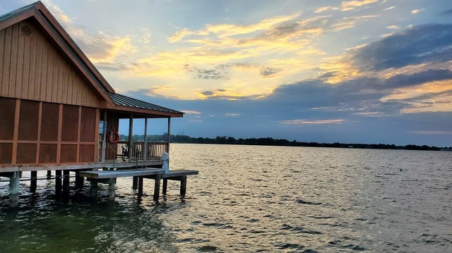 Poverty-Point-Reservoir-State-Park-overwater-cabin-at-sunset-Louisiana.jpg