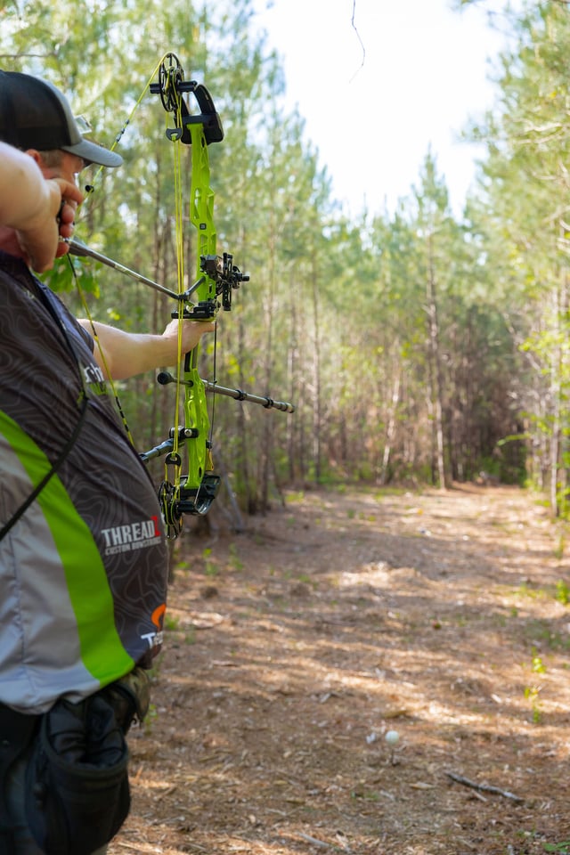 Archery at Spring Villa 2025 Man Aiming Bow (14).jpg